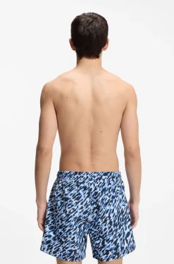 Quick-dry swim shorts with all-over print