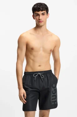 Quick-dry swim shorts with spray-effect logo