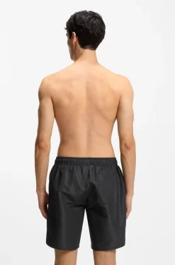 Quick-dry swim shorts with spray-effect logo