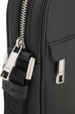 Recycled-leather reporter bag with adjustable logo strap