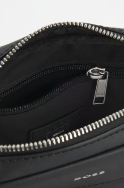 Recycled-leather reporter bag with adjustable logo strap