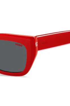 Red-acetate sunglasses with layered temples