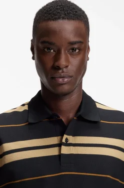 Regular-fit polo in cotton piqué with engineered stripes