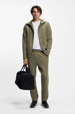 Regular-fit tracksuit bottoms in super-soft stretch fabric