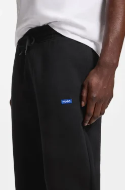 Regular-fit tracksuit bottoms in French-terry cotton