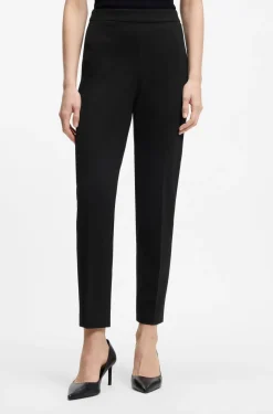 Regular-fit trousers in stretch fabric with tapered leg