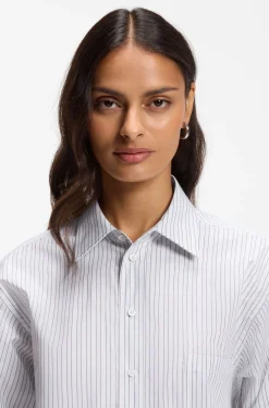 Relaxed-fit blouse in striped cotton poplin