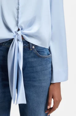 Relaxed-fit blouse with a tie-front feature