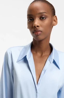 Relaxed-fit blouse with a tie-front feature