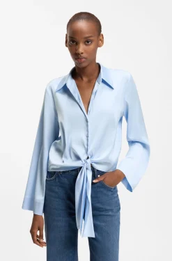 Relaxed-fit blouse with a tie-front feature