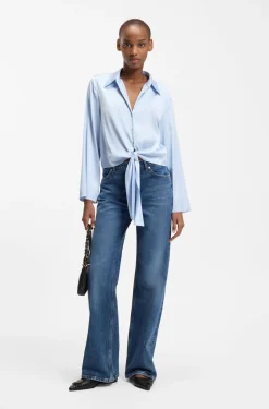 Relaxed-fit blouse with a tie-front feature