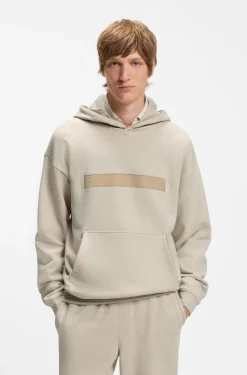 Relaxed-fit cotton-terry hoodie with wide-set logo
