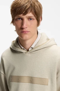 Relaxed-fit cotton-terry hoodie with wide-set logo
