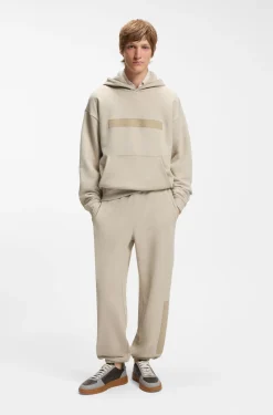 Relaxed-fit cotton-terry hoodie with wide-set logo