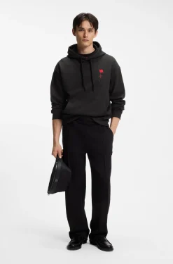 Relaxed-fit hoodie in cotton terry with rose logo
