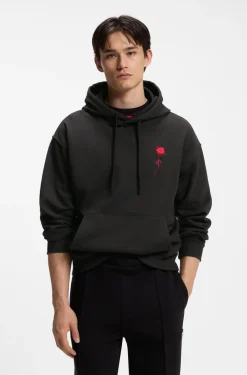 Relaxed-fit hoodie in cotton terry with rose logo