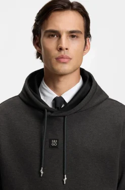 Relaxed-fit hoodie with stacked logo