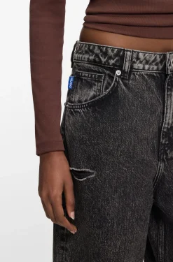 Relaxed-fit jeans in distressed black rigid denim