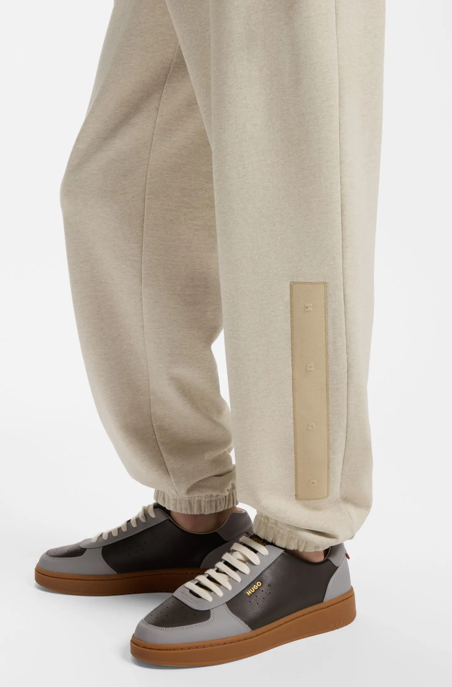 Relaxed-fit tracksuit bottoms in cotton with logo trim