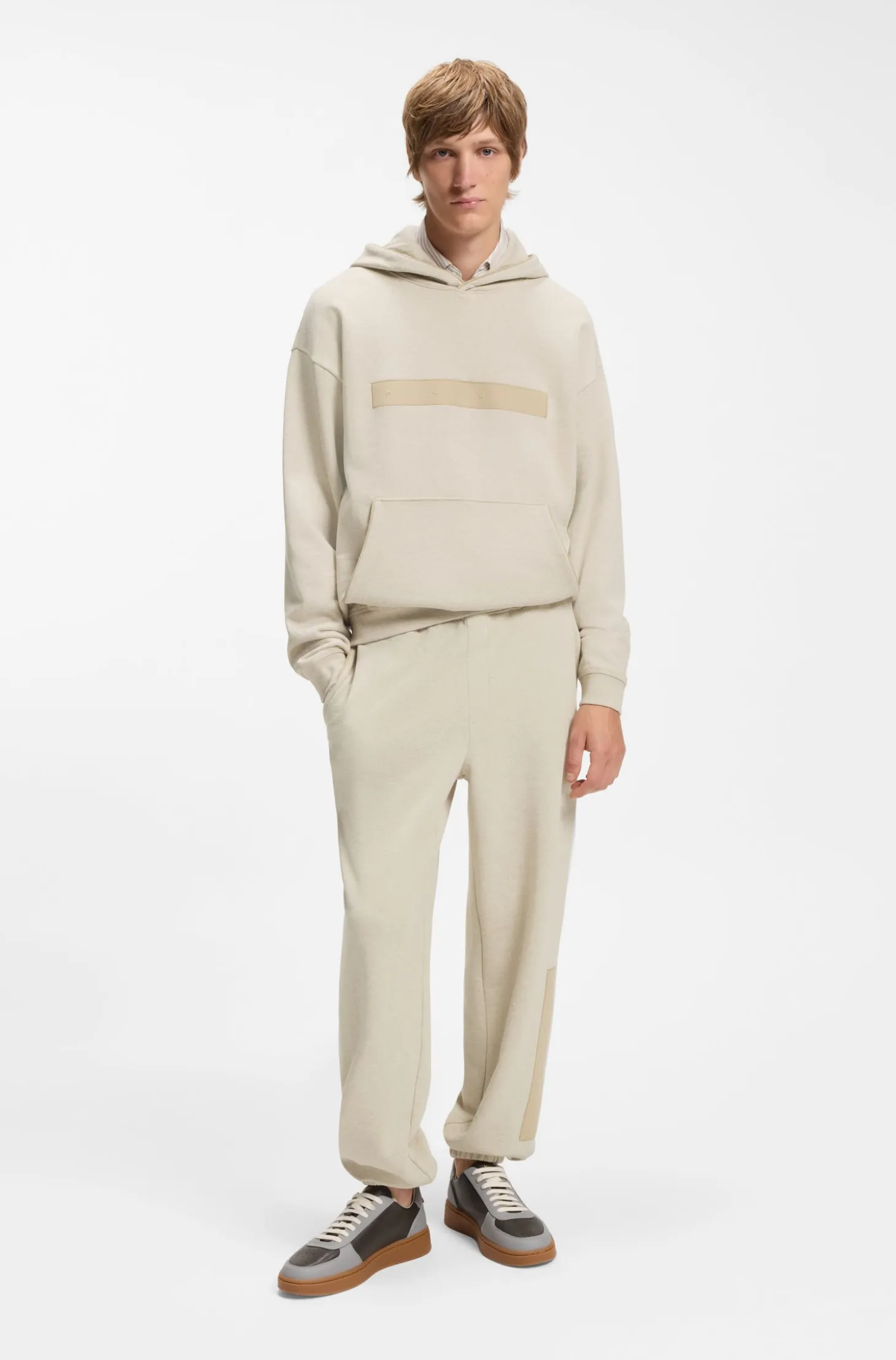 Relaxed-fit tracksuit bottoms in cotton with logo trim