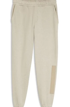Relaxed-fit tracksuit bottoms in cotton with logo trim
