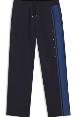 Relaxed-fit tracksuit bottoms in cotton with side stripe