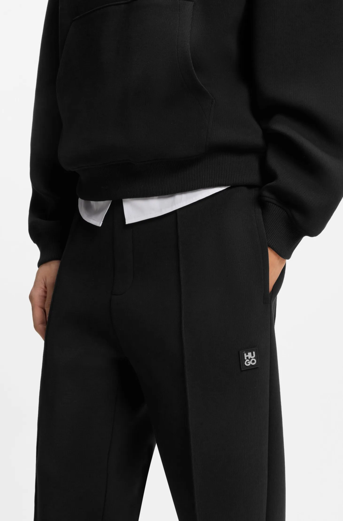 Relaxed-fit tracksuit bottoms in a structured cotton blend