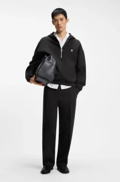 Relaxed-fit tracksuit bottoms in a structured cotton blend