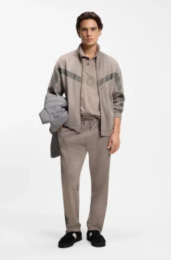 Relaxed-fit tracksuit bottoms with logo tape