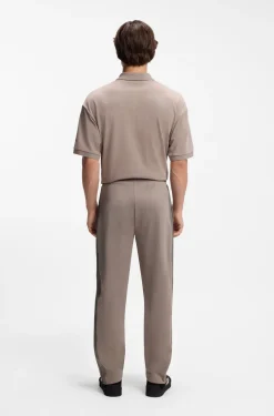 Relaxed-fit tracksuit bottoms with logo tape