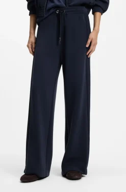 Relaxed-fit tracksuit bottoms with piping details