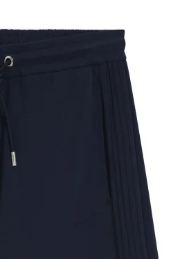 Relaxed-fit tracksuit bottoms with piping details