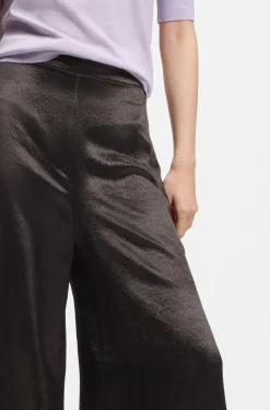 Relaxed-fit trousers in lustrous twill
