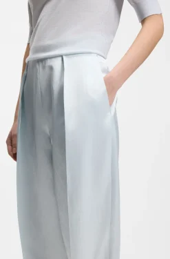 Relaxed-fit trousers in sateen with front pleats