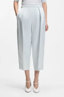 Relaxed-fit trousers in sateen with front pleats