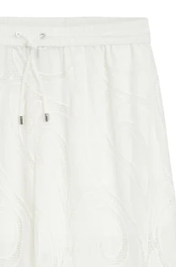 Relaxed-fit trousers with embroidered flowers