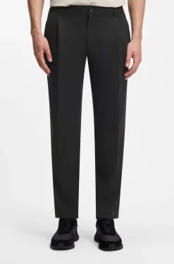 Relaxed-fit trousers with front pleats