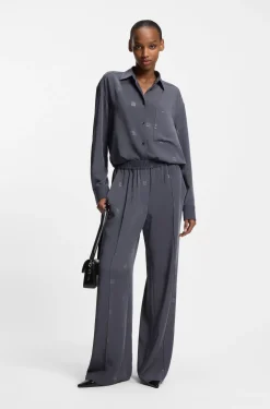Relaxed-fit trousers with stacked logos