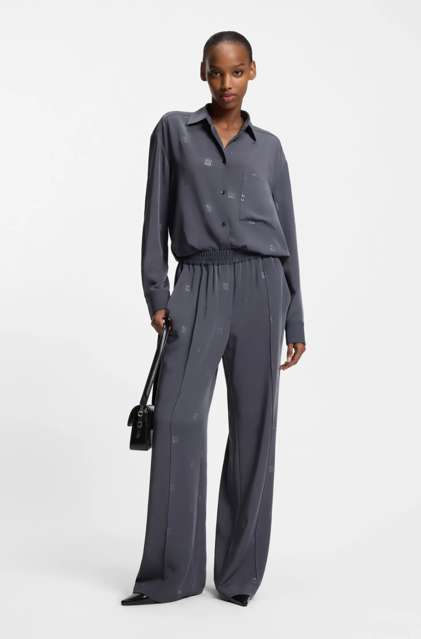 Relaxed-fit trousers with stacked logos