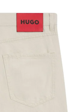 Relaxed-tapered-fit jeans in ecru denim