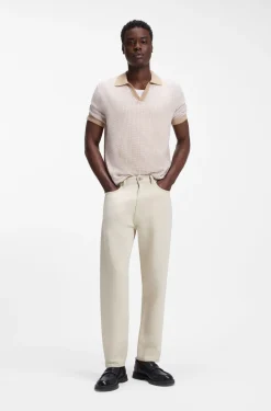 Relaxed-tapered-fit jeans in ecru denim