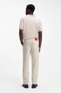 Relaxed-tapered-fit jeans in ecru denim