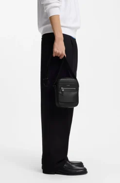 Reporter bag with hardware trims