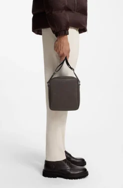 Reporter bag with silver-tone logo lettering