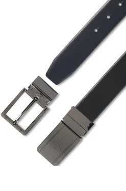 Reversible leather belt with pin and plaque buckles