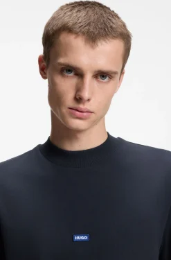 Ribbed-neck cotton T-shirt with logo badge