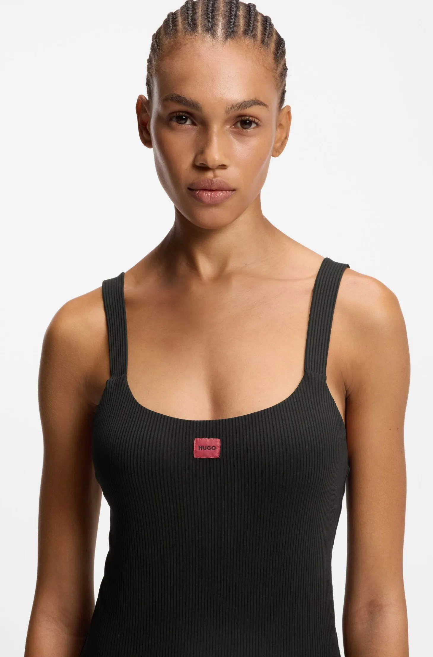 Ribbed swimsuit with red logo label