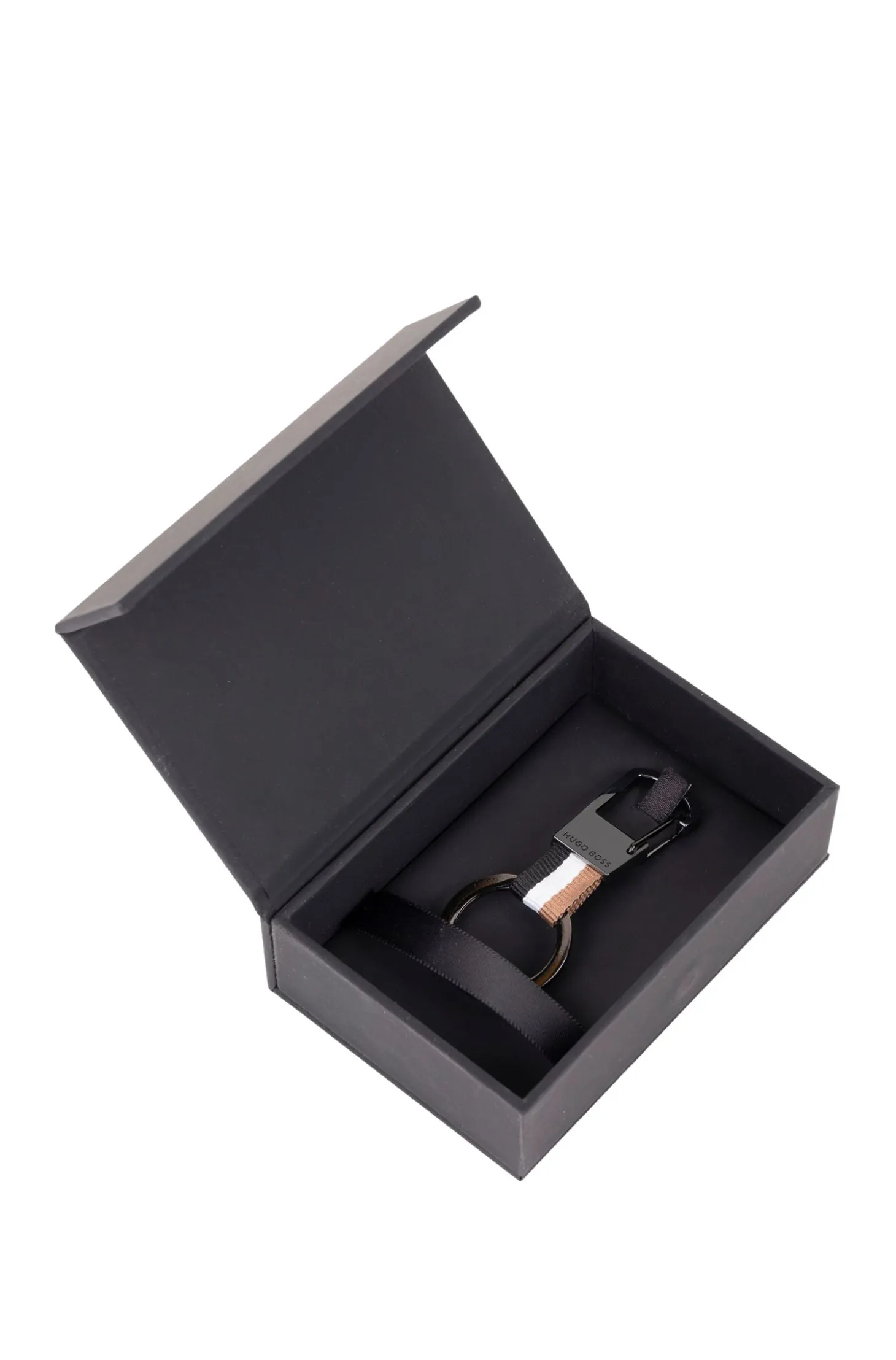 Signature-stripe key ring with dark-chrome accents
