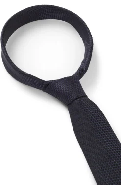 Silk tie with jacquard pattern