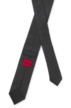 Silk tie with jacquard-woven pattern